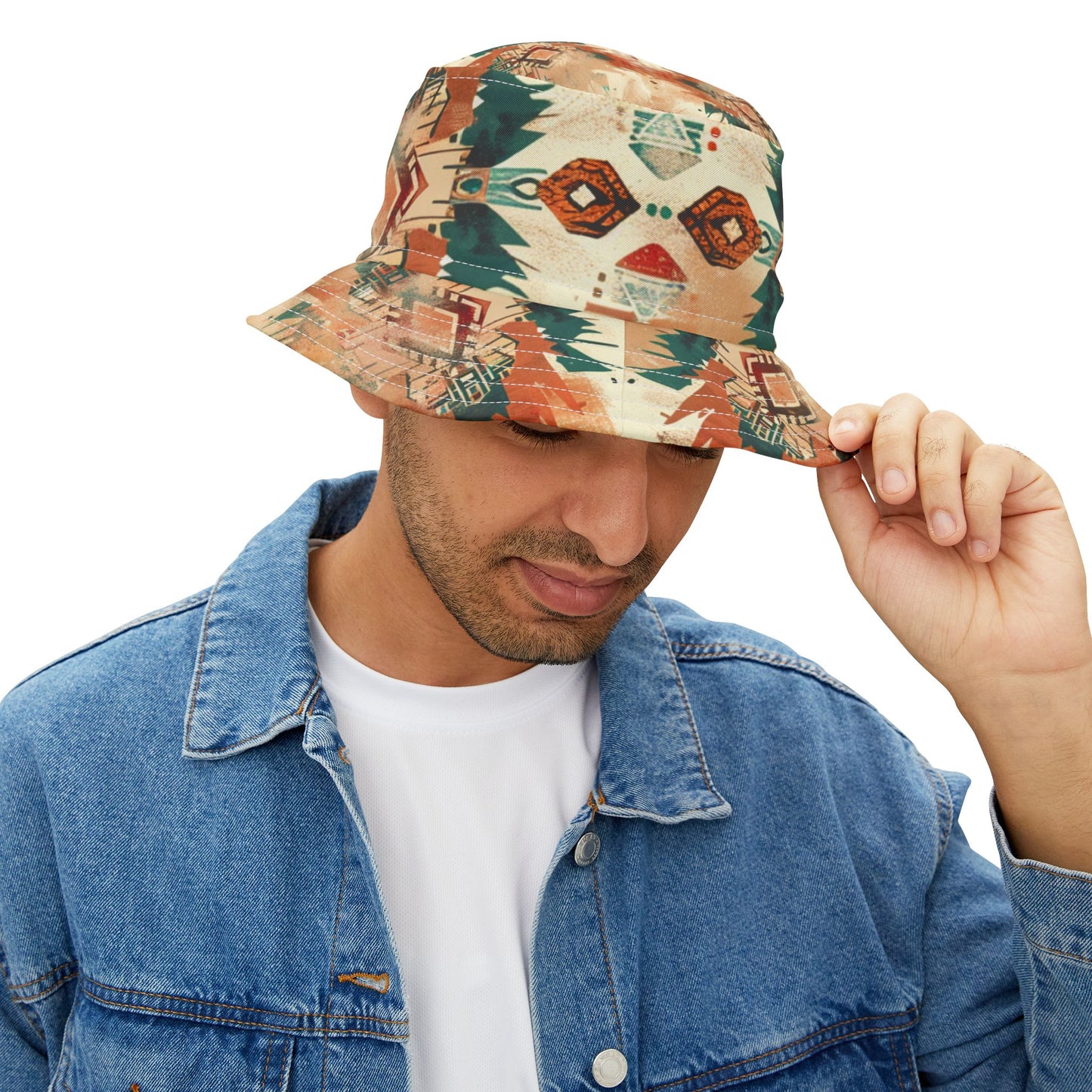 Man wearing a patterned bucket hat and denim jacket on a white background